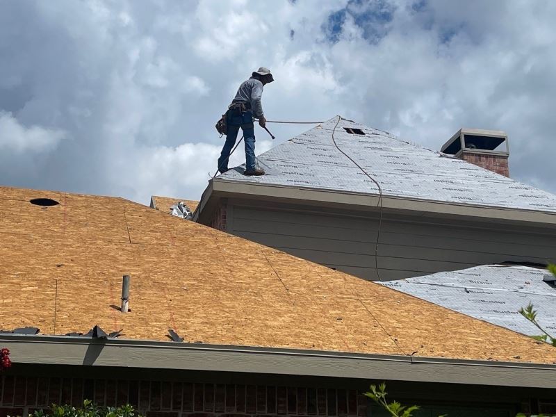 Pickle Roofing Solutions roofing consultation with a North Texas homeowner