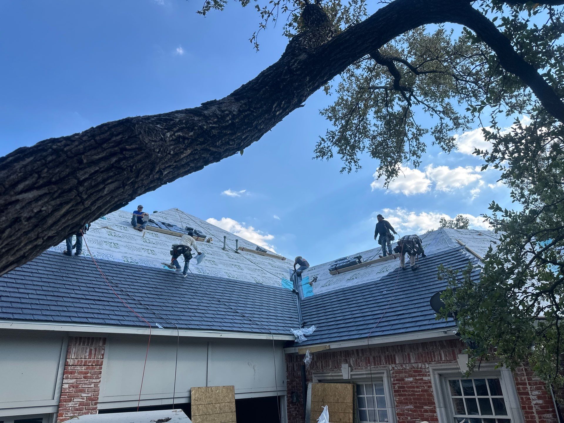 Pickle Roofing Solutions crew installing a residential roof in North Texas